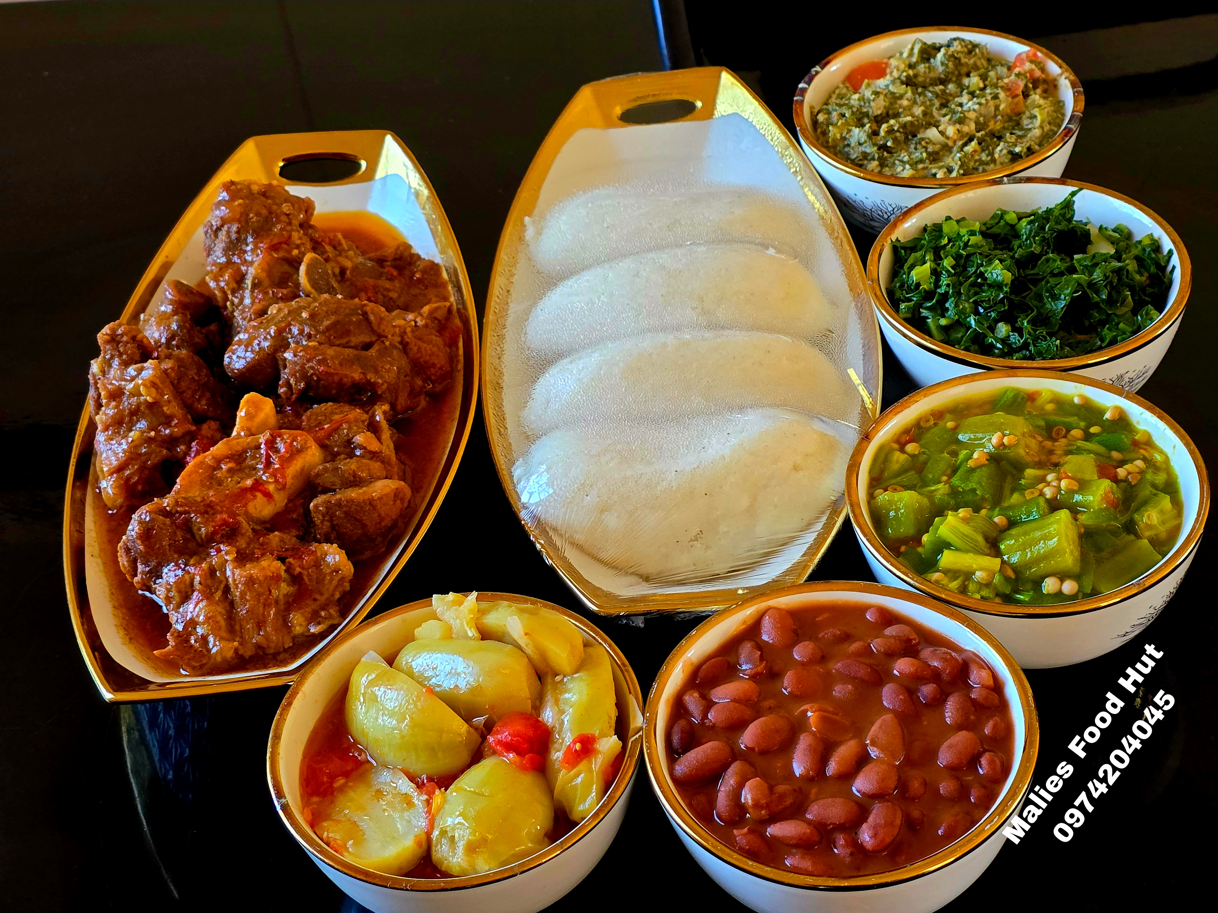 Beef stew with nsima and side relishes