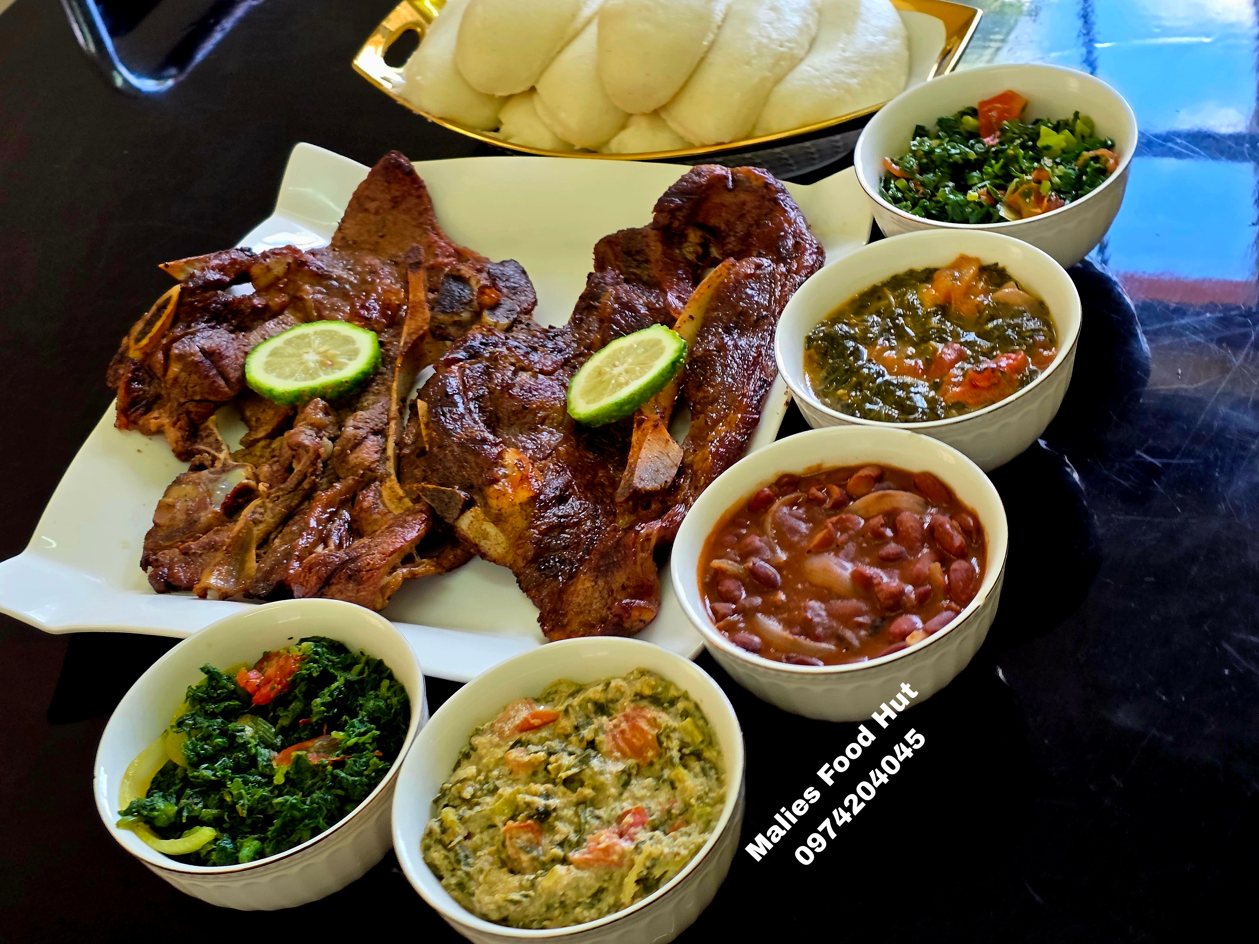 Beef ribs with lime, nsima and relishes