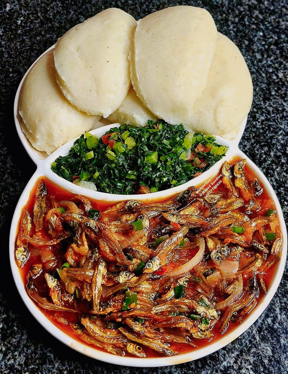 Dried kapenta in tomato sauce with nsima