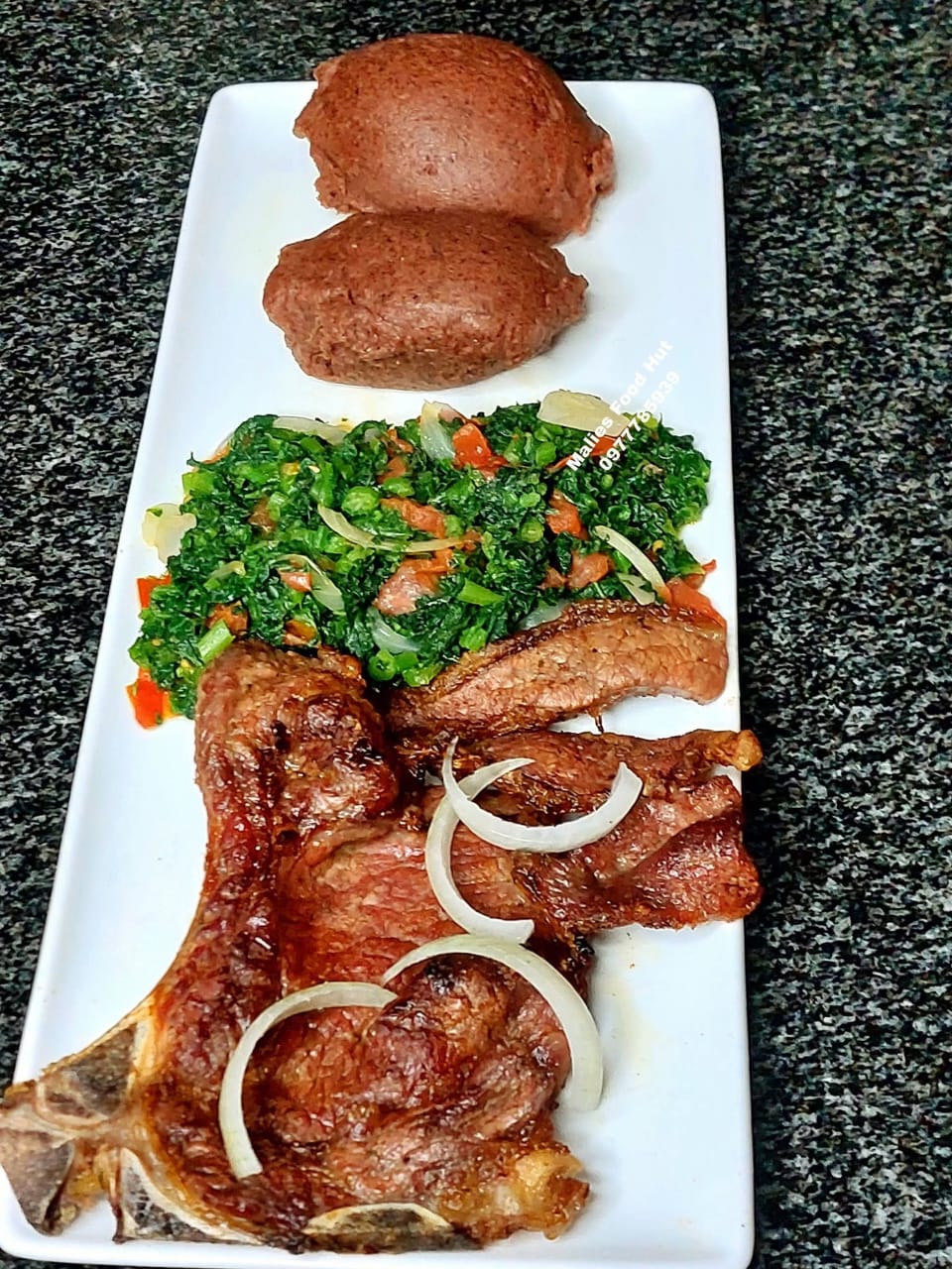 Grilled T-bone ribs with sorghum nsima